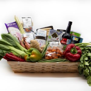 Asian Pantry Essentials food hamper with rice, noodles, sauces, seasonings, snacks and Asian cooking ingredients