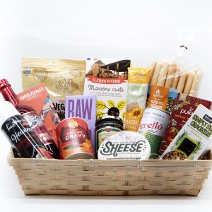 The Vegan Collection vegan gift hamper with plant-based snacks, chocolate, olives, crackers and festive treats